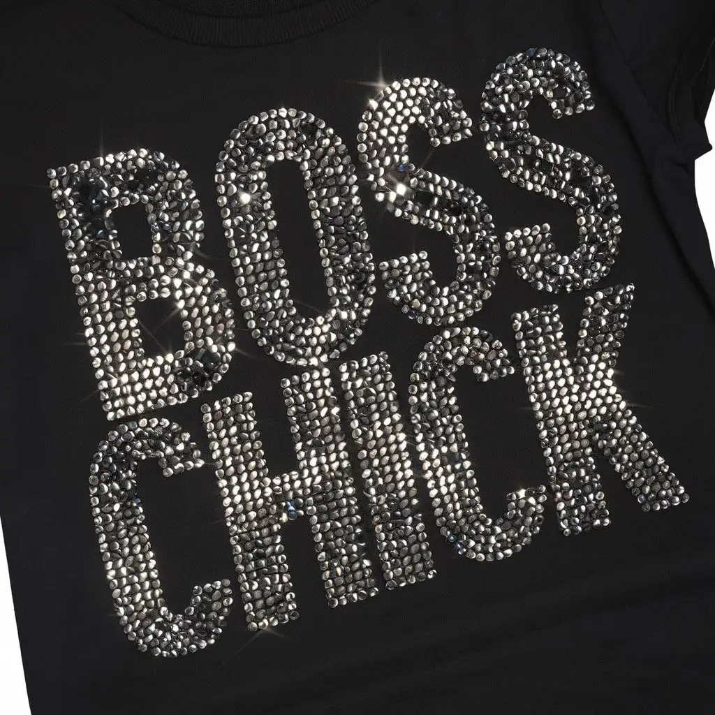 Black womens t shirt with glam rhinestones that spells the words BOSS CHICK

