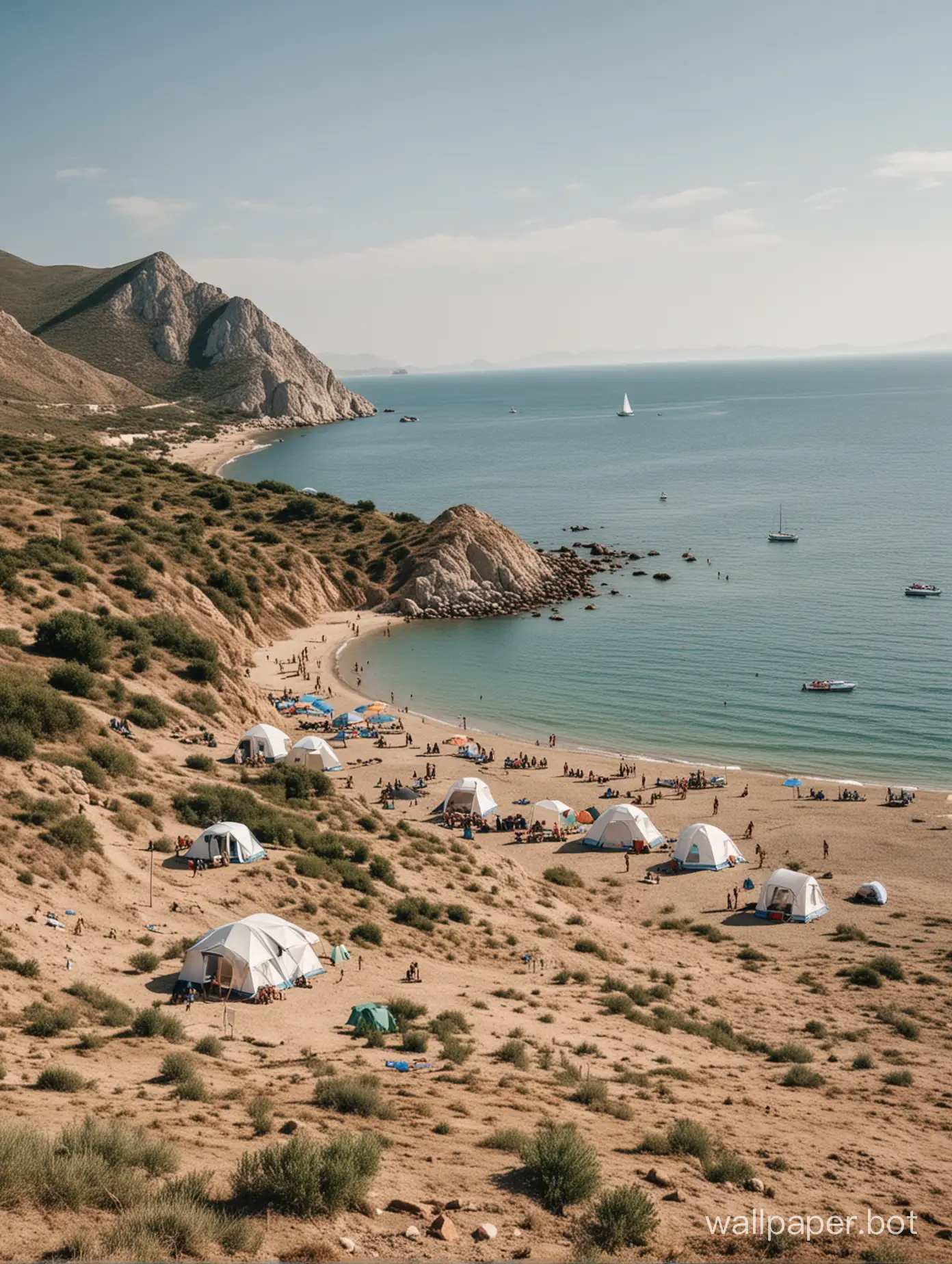 Crimea, Koktebel, a beach in the distance, yacht, few people, nudists, tents