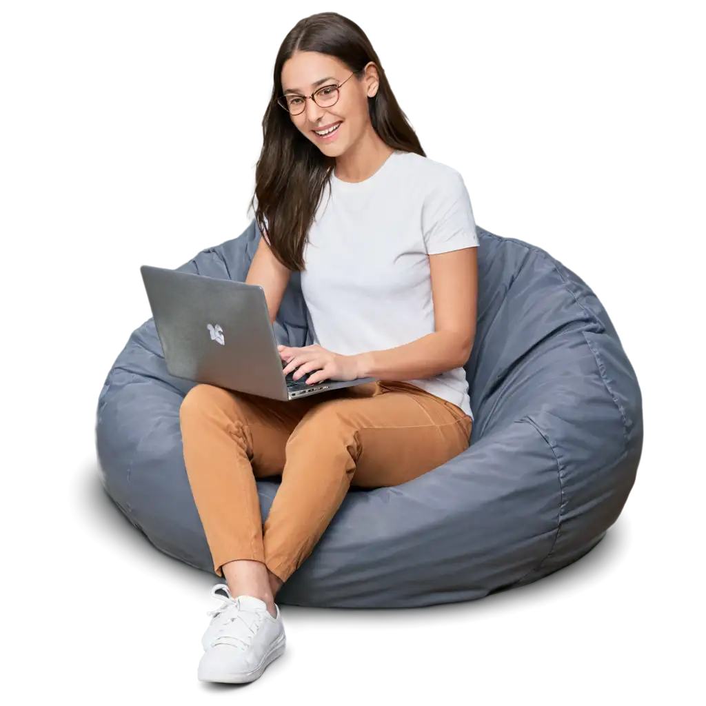 working on laptop, sitting on a beanbag chair and looking happy